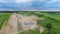 Open mine / quarry. Aerial view. Nature landscape. Massive clouds.