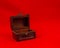 Open miniature wood treasure chest