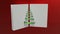 Open notebook with spiral in the form of a Christmas tree 3D rendering