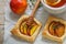 Open pies of puff pastry with peach (nectarine), thyme and honey. Breakfast