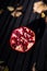 Open pomegranate on a wooden background