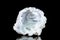 Open raw quartz druse or geode mineral stone in front of black background