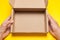 Open recycled parcel address delivery box, brown postal carton paper