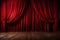 open red curtain on stage of theater, opera or cinema slightly ajar, empty scene background