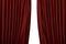 Open red curtains in theatre