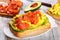 Open sandwich with omelette, avocado and salmon