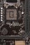Open socket for processor on motherboard for office PC, close up