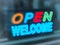 Open Welcome. De focused color LED bokeh twinkling lights