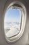 Open window with sky on a comercial aeroplane. Cabin interior