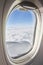 Open window with sky on a comercial aeroplane. Cabin interior