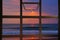 Open window to see twilight tone sunrise at sea in Thailand