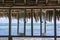 Open windows of thatched roof veranda overlooking the turquoise ocean on the island of Zanzibar, Tanzania, Africa