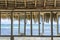 Open windows of thatched roof veranda overlooking the turquoise ocean on the island of Zanzibar, Tanzania, Africa