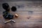 Open the wine. Corkscrew near bottle, glass, grape on wooden background top view copyspace