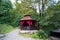 Open wooden brown gazebos in the mountains above the mountain river for outdoor food