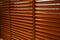 Open wooden venetian blinds. lighting range control sunlight coming from a window. decoration interior. Modern jalousie