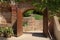 An opened ancient wood gate in Alhambra, Granada, Spain