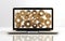 opened blank laptop with intersecting golden gears over screen and on white background