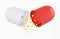 Opened capsule pill white and red color