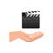 Opened clapperboard in hand. Movie clapperboard. Vector stock illustration.