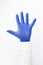 Opened palm, hand in blue latex Glove .Copy space