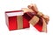 Opened red gift box with rustic burlap bow and ribbon