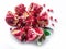 Opened ripe pomegranate fruit on the white background. Top view