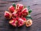 Opened ripe pomegranate fruit on wooden table. Top view