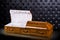 Opened wooden brown sarcophagus isolated on gray luxury background. casket, coffin on royal background.