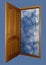 Opened wooden door with heaven on blue