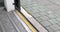 Opening and closing automatic door on the floor inside light rail tram.