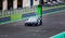 Opening gate green light start racing electric Cupra touring car on