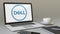 Opening laptop with Dell Inc. logo on the screen. Modern workplace conceptual editorial 4K clip