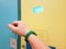 Opening the lock of the locker on personal items with the help of an impulse of an electromagnetic bracelet worn on the wrist.