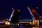 Opening of Palace drawbridge. Night view of Palace bridge from the Neva river in Saint Petersburg, Russia