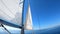 Opening the sail during yachting on sailing luxury yacht in the sea at sunny day, Croatia
