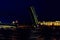 Opening of Trinity drawbridge. Night view of Trinity bridge from the Neva river in St. Petersburg, Russia