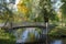 Openwork iron bridge over the canal. The Gatchina Park
