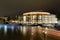 The opera building at night in the center of Amsterdam in the