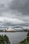 Opera House and Harbour Bridge behind under cloudscape, Sydney A