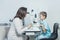 Ophthalmologist checks the boy`s vision. Vision tests in children. Hyperopia