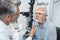 Ophthalmologist doing eye test on old patient