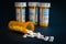 Opioid Crisis - Open Bottle of Prescription Painkillers. Medicare, overdose.