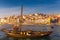 Oporto or Porto city skyline, Douro river, traditional boats and Dom Luis or Luiz iron bridge. Porto, Portugal, Europe