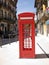 Oporto street old red telephone cabin