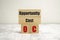 opportunity cost words on wooden blocks and white background