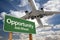 Opportunity Green Road Sign and Airplane Above