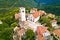 Oprtalj. Idyllic hill village of Oprtalj in green landscape aerial view