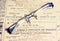 optical eyeglasses lie on the newspaper with English fonts,toned