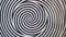 Optical illusion of spinning black and white circles.